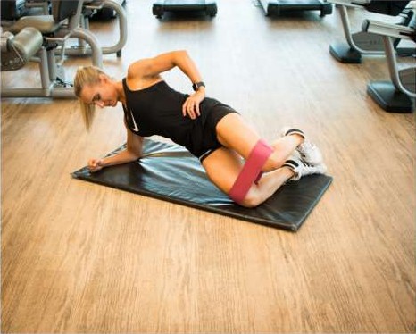 Clam exercise with a resistance band, knee lifted