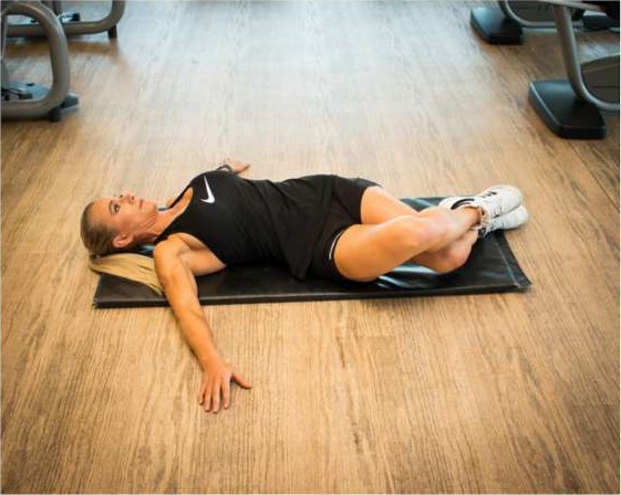 Lying cross over stretch for the glutes and lower back