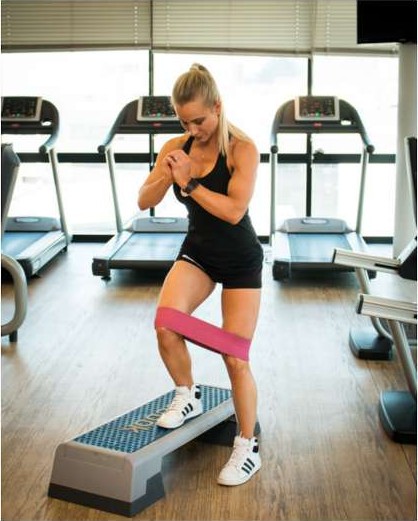 Lateral step up with a band around the knees
