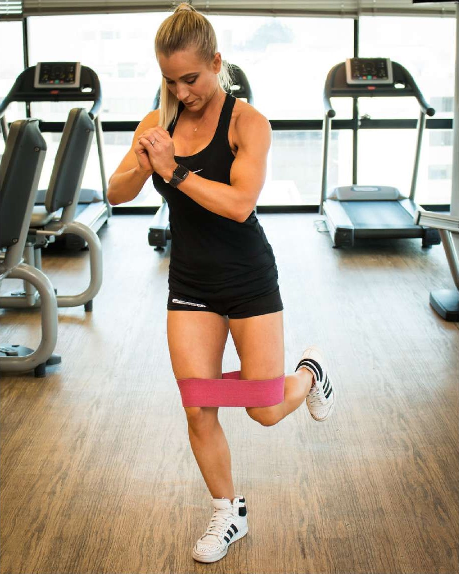 Single leg stalk stand with a band above the knees
